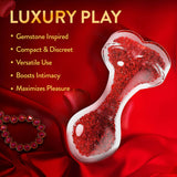 Oh My Gem Lustre Glass Anal Plug Red on a luxurious red background with gemstone inspired design and features.