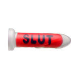 Master Series SLUT Silicone Dildo in bold design with the word 'SLUT' printed on it, showcasing its unique style.