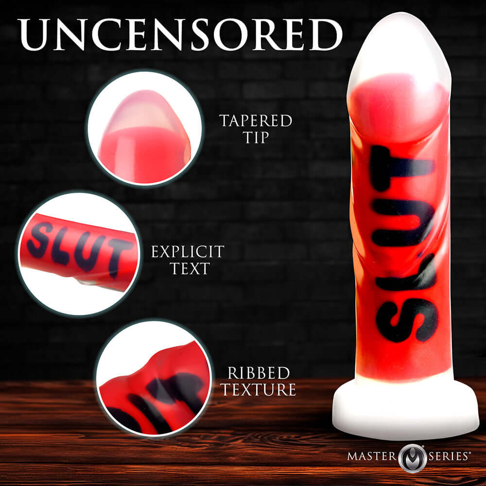 Master Series SLUT Silicone Dildo showcasing tapered tip, explicit text, and ribbed texture for intense pleasure.