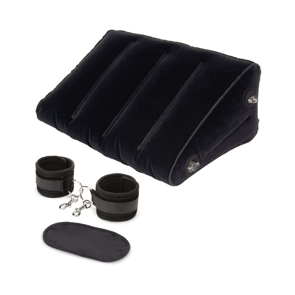 Lux Fetish Inflatable Position Wedge with Detachable Cuffs for enhanced comfort and support in intimate play.