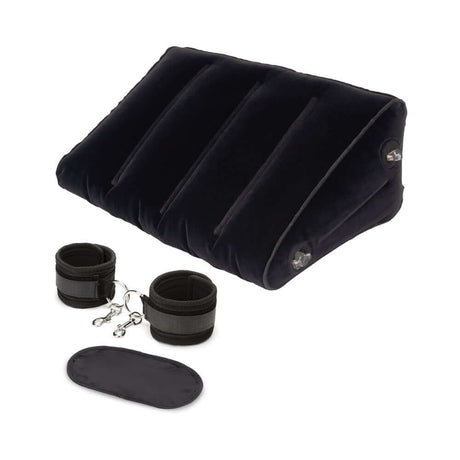 Lux Fetish Inflatable Position Wedge with Detachable Cuffs for enhanced comfort and support in intimate play.