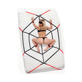 Lux Fetish Webbed Up Bedspreader Restraint System on a bed with a bound model in lingerie.