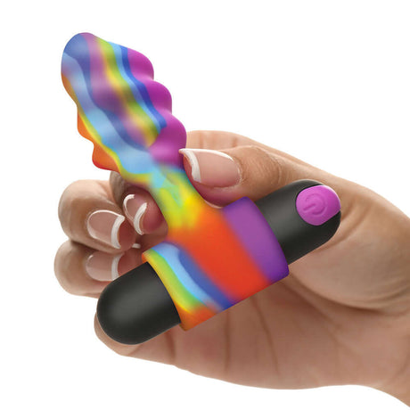 BANG Vibrating Rainbow Butt Plug held in hand showcasing vibrant colors and ergonomic design.