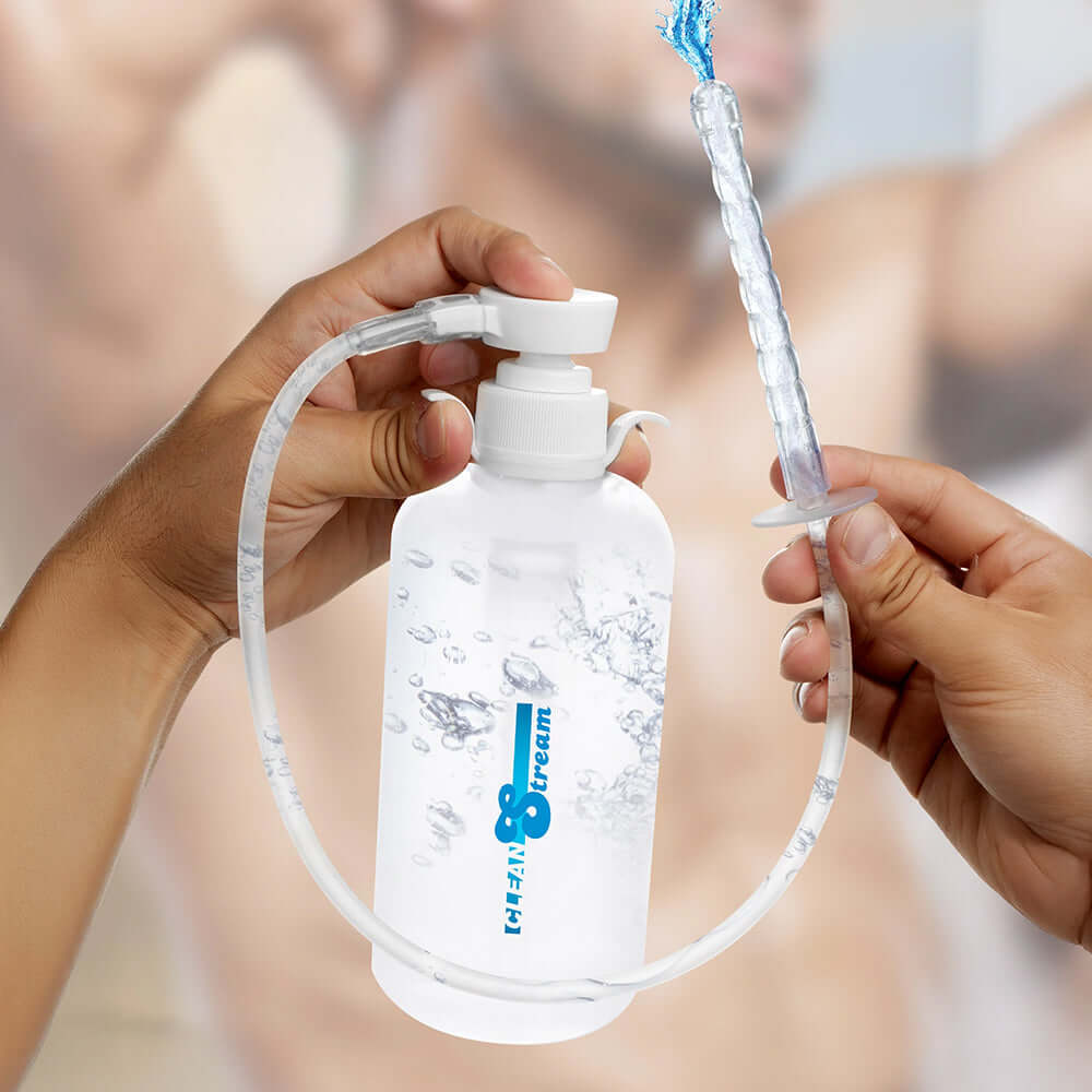 CleanStream XL Enema Bottle with 3 Attachments held in hands, demonstrating ease of use for hygiene.