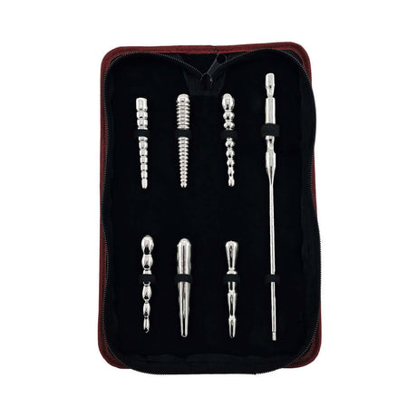 Rouge Stainless Steel Penis Plug Set 7 Pc with Bag displayed neatly in a zippered case with black interior.