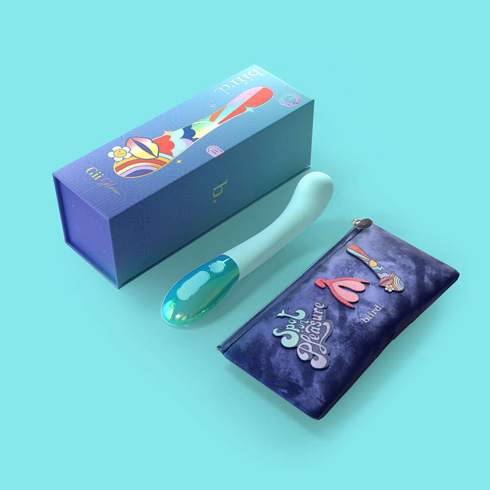 Biird Gii Glow Massager Mint with stylish packaging and accessory pouch on a mint background.