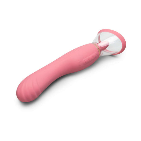 Le Wand Lick Double Ended Vibrator in soft pink silicone with a unique design for pleasure.