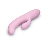 Le Wand Hither Rocking Rabbit Vibrator in a soft pink color, designed for dual-stimulation and G-spot pleasure.