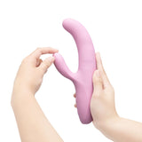 Le Wand Hither Rocking Rabbit Vibrator held in hands, showcasing its curved design for dual-stimulation.
