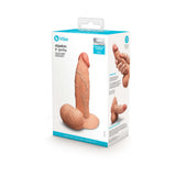 b-Vibe Slipskin Realistic Silicone Dildo 6 inch Girthy Mocha packaged product image on display.