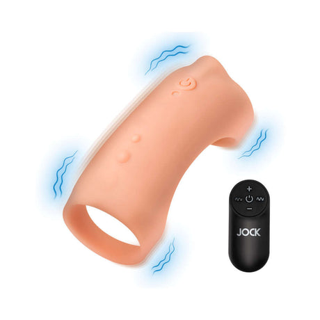 JOCK Vibrating Silicone Penis Sleeve Medium in a soft tone with remote control, designed for enhanced stimulation and comfort.