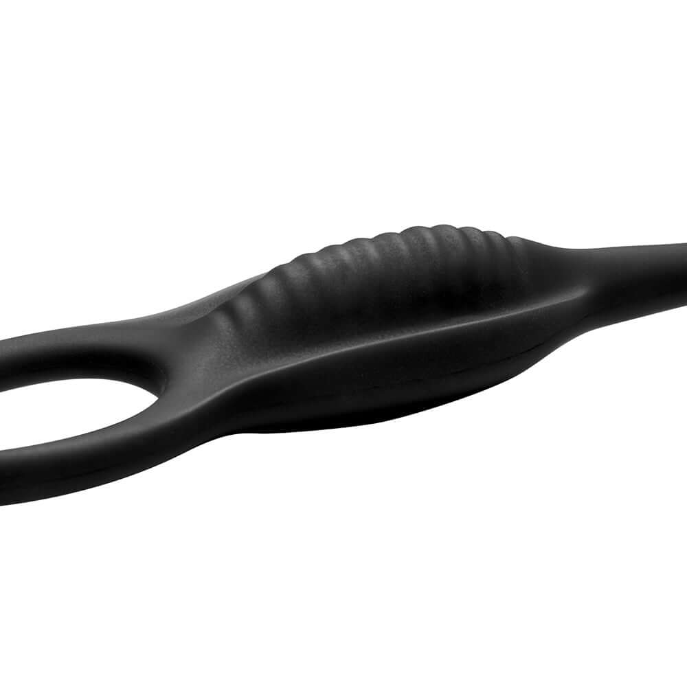 JOCK Silicone Vibrating Anal Plug with Cock and Ball Ring close up view, showcasing textured design for enhanced stimulation.