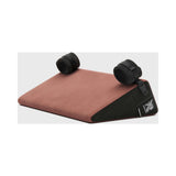 Liberator Black Label Wedge 24 inch Pillow with Cuffs Mauve on a gray background, providing support and comfort.