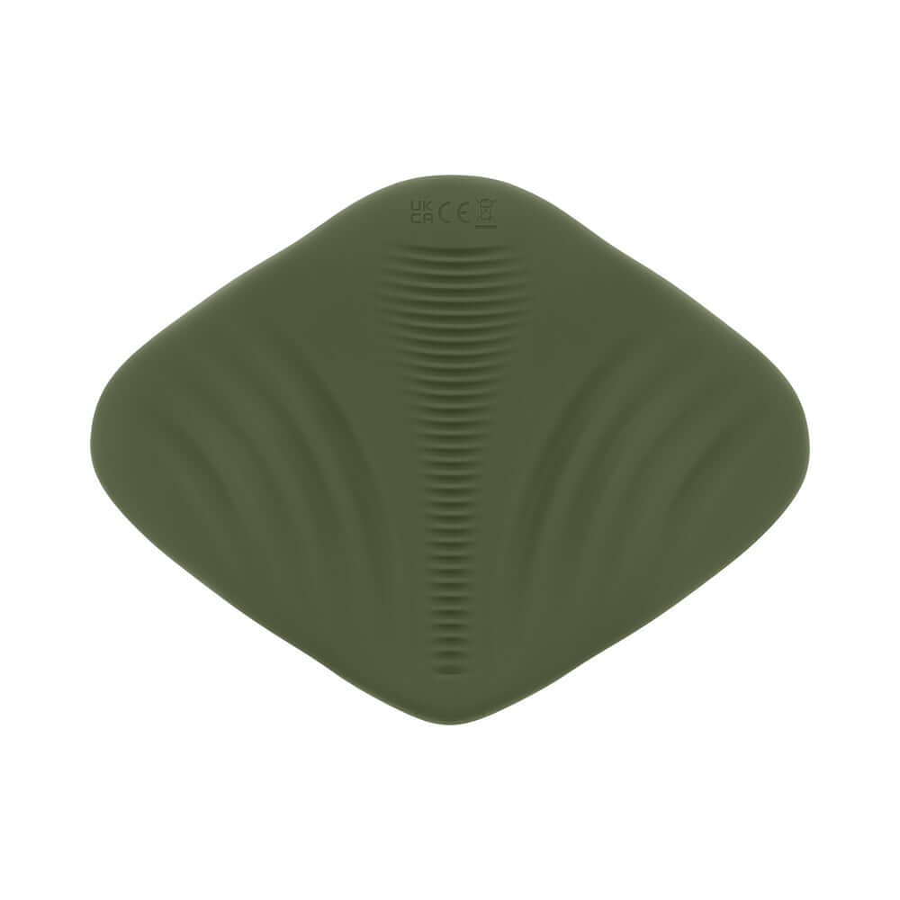 Gender X Pleasure Pad Rechargeable Grinding Pad and Stroker in soft green silicone with contoured surface.