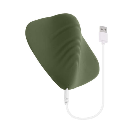 Gender X Pleasure Pad Rechargeable Grinding Pad and Stroker with USB charging cable, featuring contoured silicone design.