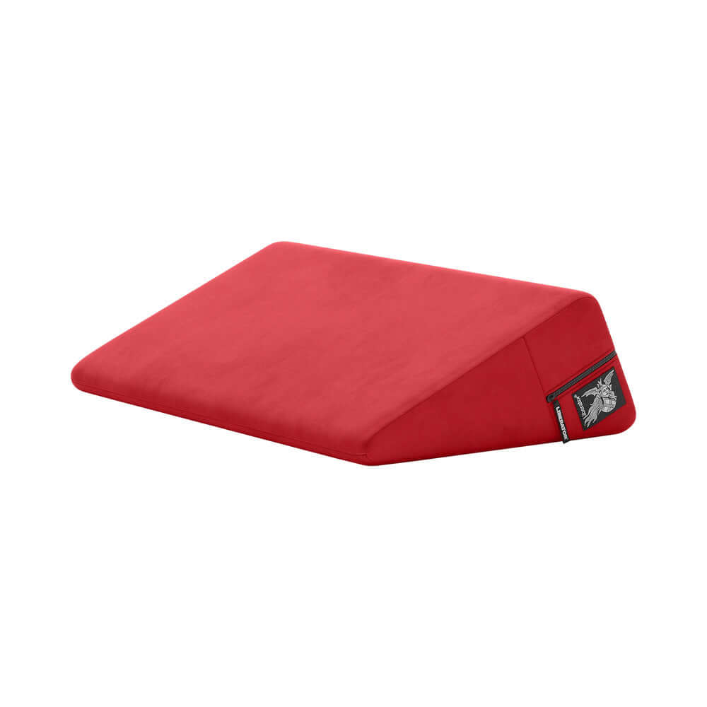 Liberator Wedge Positioning Aid Decor Velvet Red on a white background, showcasing its ergonomic design and luxurious texture.