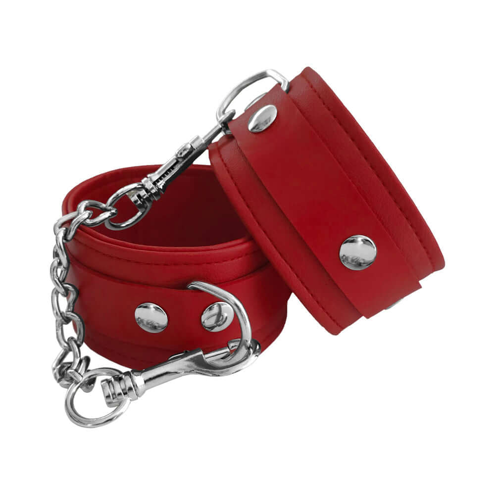 Rouge Fetish Play Vegan Wrist Cuffs Red with chain detail for comfortable restraint in bondage play.