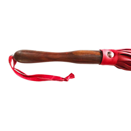 Rouge Fetish Play Vegan Wooden Handle Flogger Red with soft faux leather tails and sturdy wooden grip.