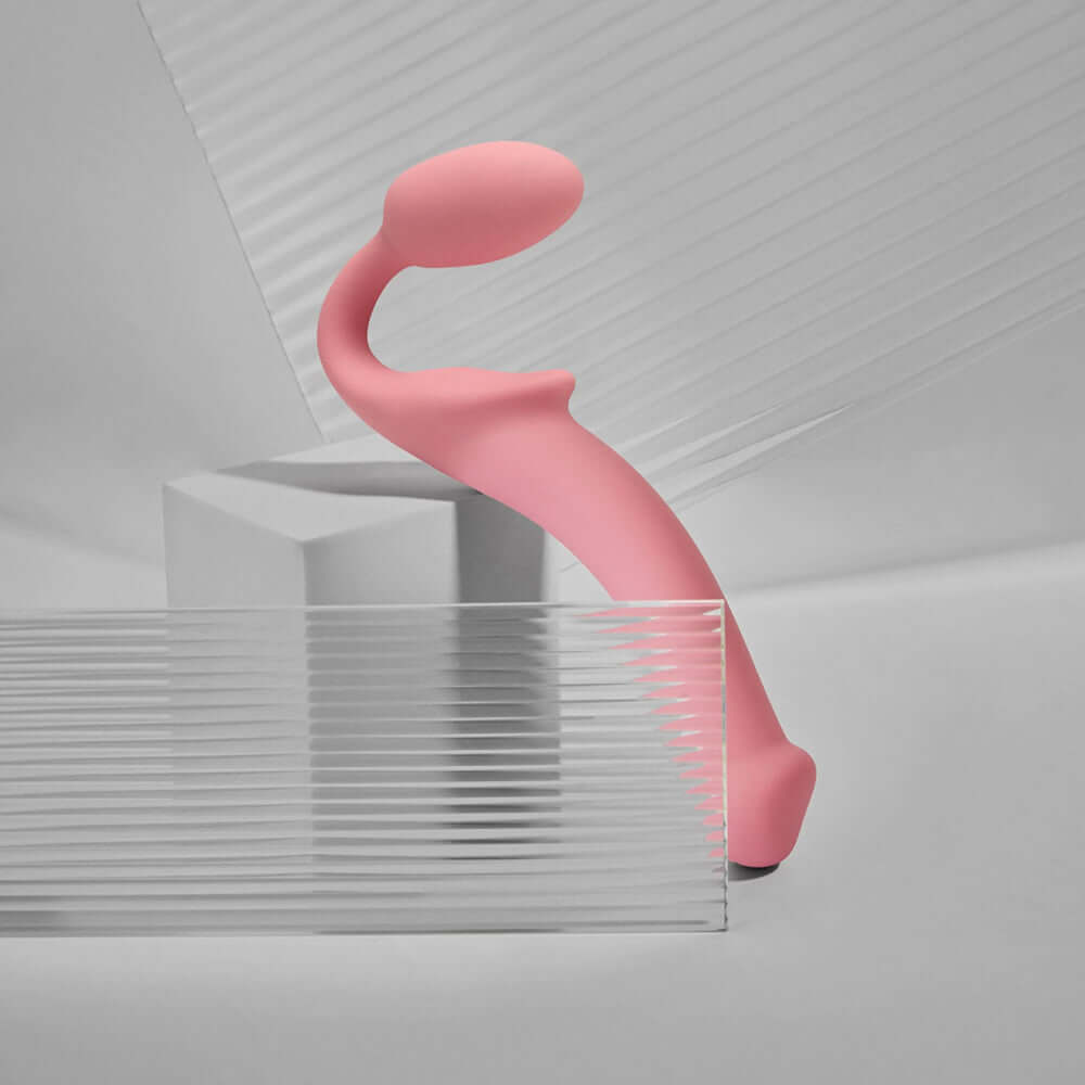 Strap-On-Me Silicone Bendable Strapless Strap-On Pink Large displayed elegantly on a minimalist background.