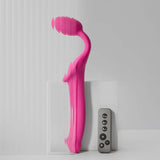 Strap-On-Me Vibrating Bendable Strapless Strap-On Fuchsia Large next to its remote control