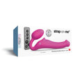 Strap-On-Me Vibrating Bendable Strapless Strap-On Fuchsia Medium packaging showcasing its elegant design and control panel.