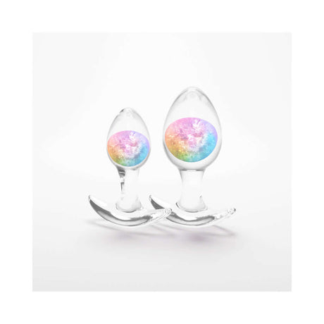 Cosmic Glams Silicone Anal Plug Kit 2pc Set Rainbow featuring two colorful silicone anal plugs.