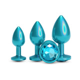 Rear Assets Trainer Metal Plug Kit Iridescent Teal - a set of smooth, chrome-plated anal plugs in shimmering teal.