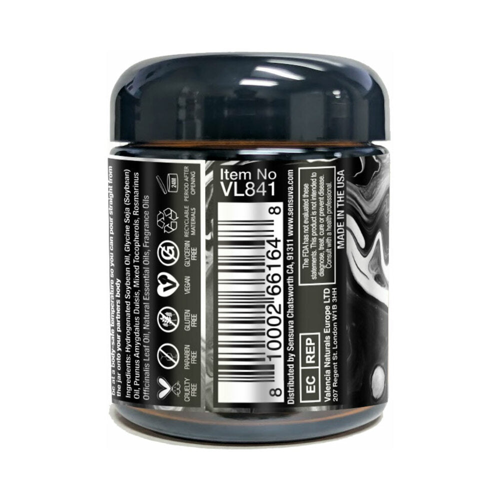 Sensuva Hero Dark Temptation Luxury Massage Candle 4 Oz packaging with black and white design and product details.