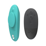 We-Vibe Moxie Plus Wearable Clitoral Vibrator Teal and remote control for discreet pleasure.