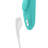 We-Vibe Moxie Plus Wearable Clitoral Vibrator Teal close-up with charger
