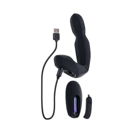 Zero Tolerance Mr Prostate Twirling Prostate Vibe with Remote shown with USB charging cable and remote control.