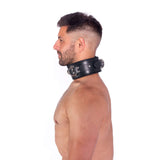 Prowler RED Leather Lockable Collar S M worn by a man, showcasing its stylish design and sturdy construction.