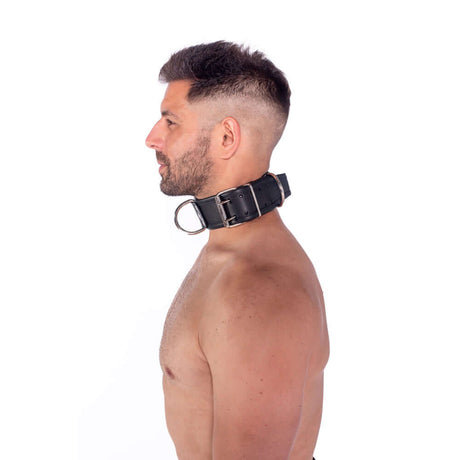 Prowler RED Leather Collar Black L XL on a man, showcasing a bold and durable design with metal hardware.