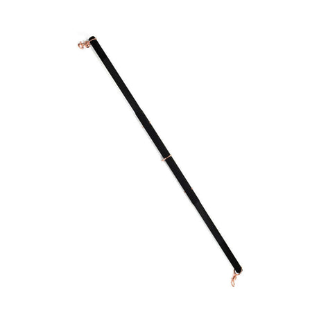 Coquette Pleasure Spreader Bar Black featuring a velvet finish and metal accents for bondage play.