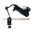 The Handy Handsfree Desk Mount with sturdy clamp and articulating arm for hands-free use.