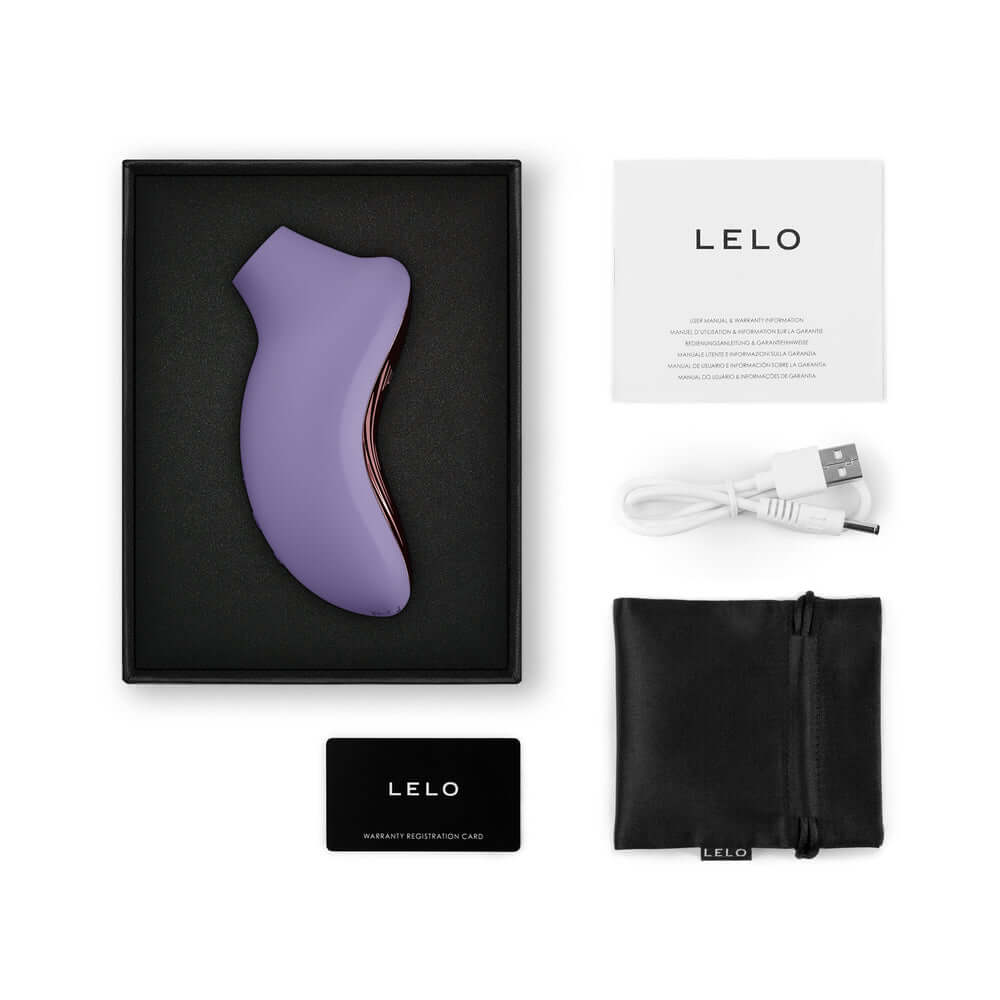 LELO SONA 3 Sonic Clitoral Massager Violet in packaging with USB, registration card, and storage pouch.