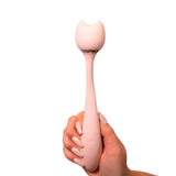 Purrs Like A Kitten Wand Vibrator held in hand, showcasing its cute cat design and sleek silicone finish.