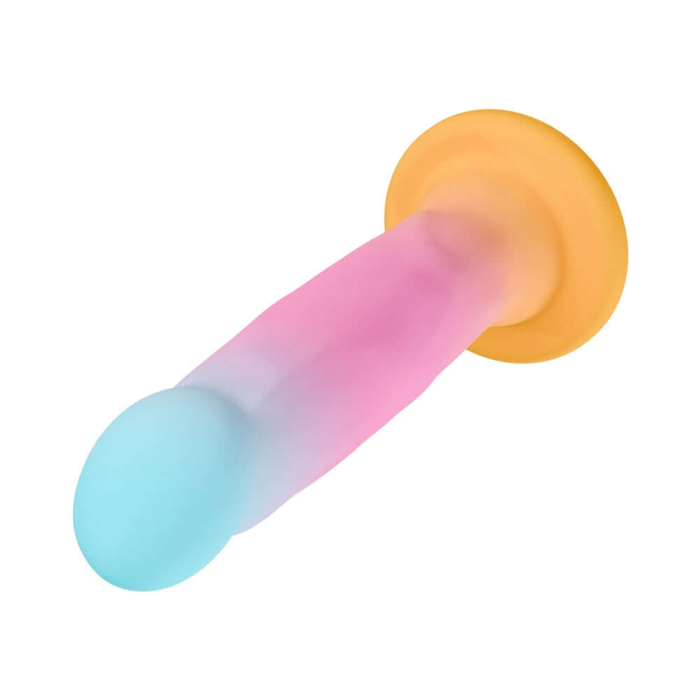 Avant Golden Dawn Artisan Dildo in soft pink and blue hues with a broad base for stability and pleasure.