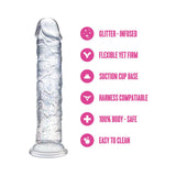 Naturally Yours Gala Sparkling Dildo Clear, a glitter-infused clear dildo with firm flexibility and suction cup base.
