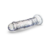 Naturally Yours Glamor Sparkling Dildo Clear featuring a glitter-infused design for enhanced pleasure.