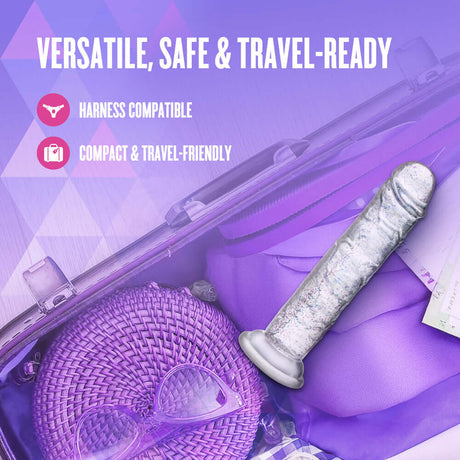 Naturally Yours Glamor Sparkling Dildo Clear in a travel bag, highlighting its versatility and travel-friendly design.