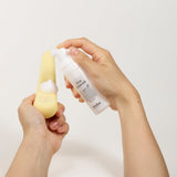 Tenga Iroha Item Cleaner Foaming Toy Cleaner being applied on a toy for hygienic maintenance.