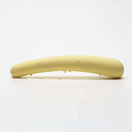 iroha tsuki MIKAZUKI Massager showcasing its elegant design and smooth finish with droplets on the surface.