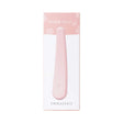 Iroha Tsuki Mikazuki Nadeshiko Massager in a light pink packaging showcasing the elegant crescent design.