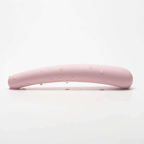 iroha tsuki MIKAZUKI NADESHIKO Massager shown with water droplets on a soft pink surface.