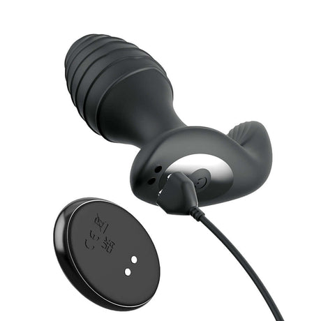 Anal Fantasy Elite Gyro-Milk Pro Black showing the vibrating plug and remote control for enhanced prostate pleasure.