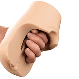 PDX Plus Pussy Pounder Squeeze Stroker Light being squeezed for enhanced pleasure.