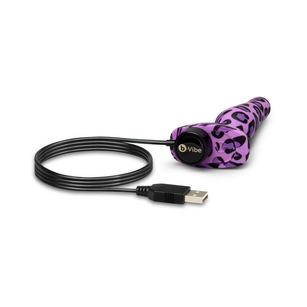 b-Vibe Novice Butt Plug Leopard with USB charging cable for beginners in anal exploration.