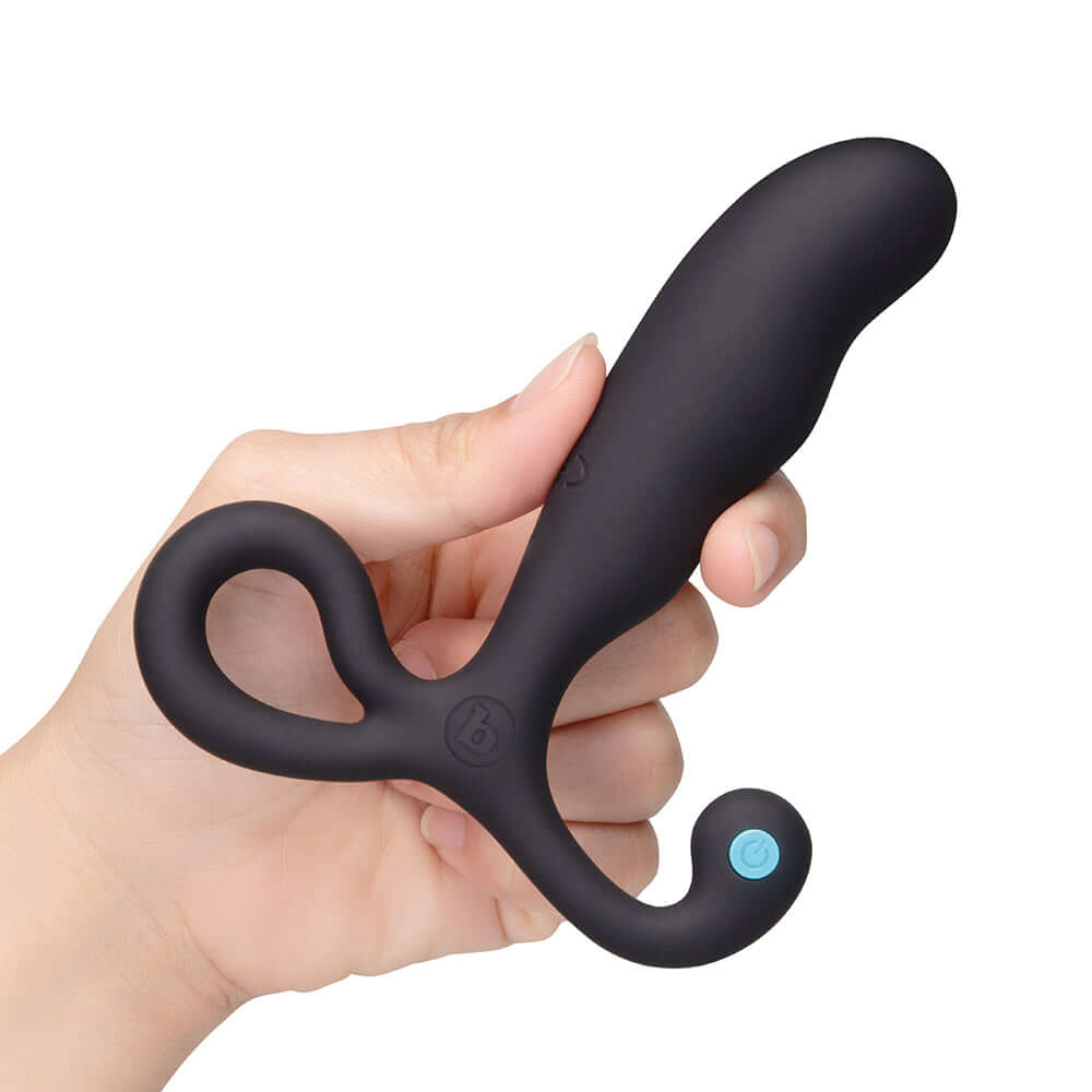 b-Vibe P-Spot Vibing Prostate Massager held in hand showcasing its ergonomic design and customizable settings.