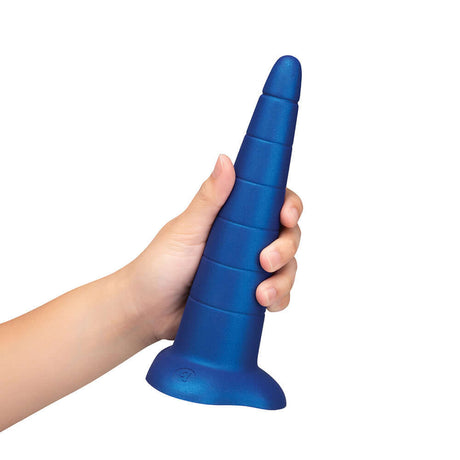 Hand holding the b-Vibe Anal Stretcher Training Cone in blue, designed for gradual anal expansion.